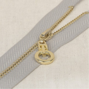 Fermeture éclair boucle métal dorée non séparable 20cm coloris gris clair