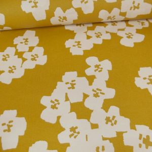 Coton enduit léger Rico Design motifs fleurs blanches sur fond moutarde 1,40mx0,10m (minimum de coupe 50CM)